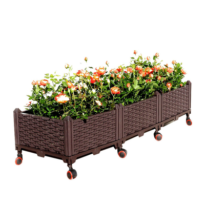 Uno mismo que riega el plantador plástico almacenable aumentado rectangular de la caja de la flor de la caja del plantador