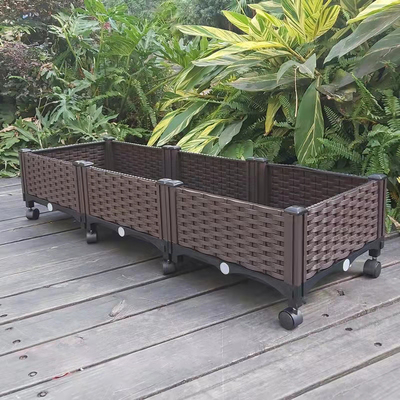 Plantador plástico rectangular grande de la protección de Sun en el antioxidante de las ruedas
