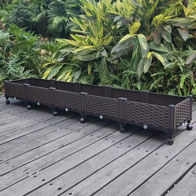 Plantador plástico rectangular grande de la protección de Sun en el antioxidante de las ruedas